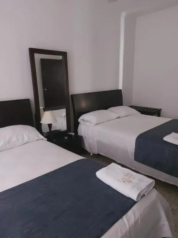 Casa Hotel Miriam - Chambres