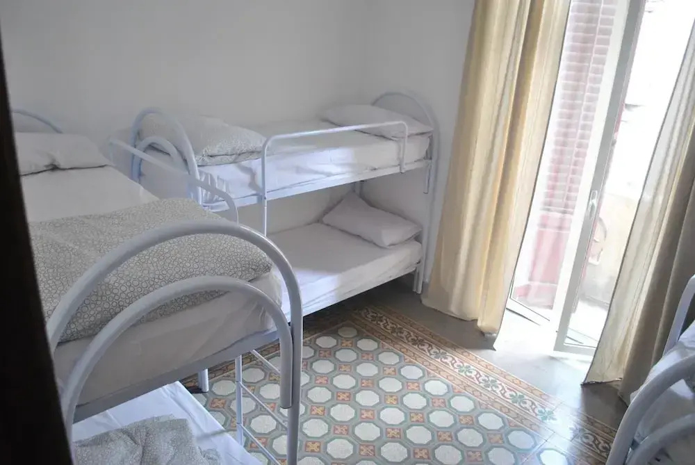 Bed in Dorm with balcony and with city view