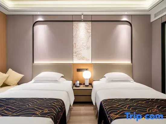 Huagang Hotel - Chambres