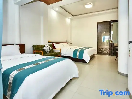 Yiya Holiday Inn - Chambres