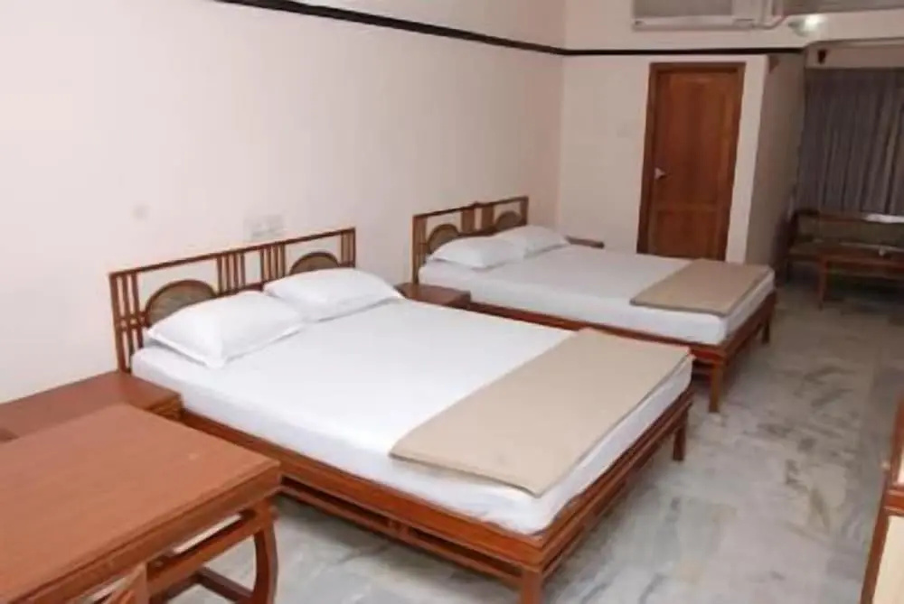 Amogha International Hotel - Chambres