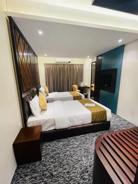 Richmond Hotel & Apartments - Chambres