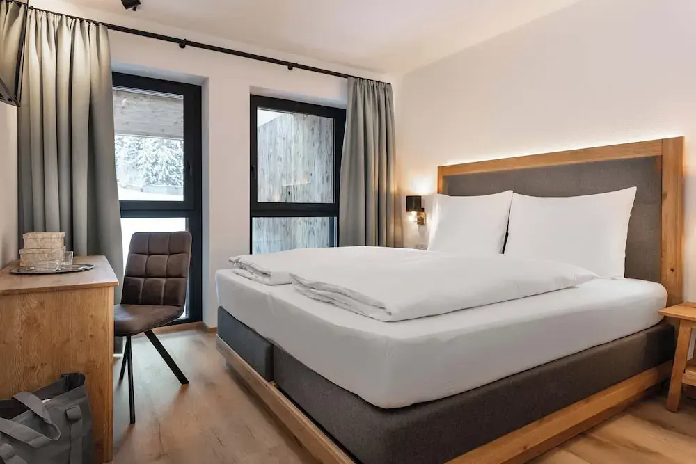 AlpenParks Hotel & Apartment Taxacher - Chambres