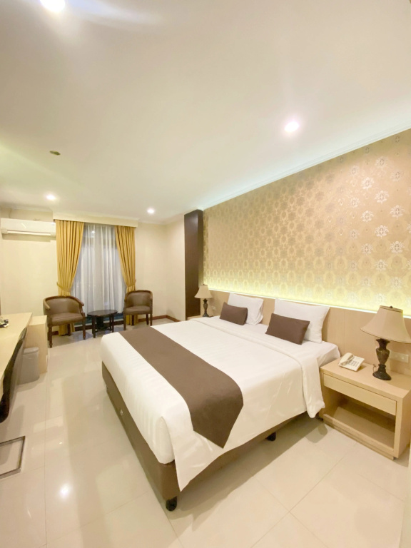 The Amrani Syariah Hotel - Chambres