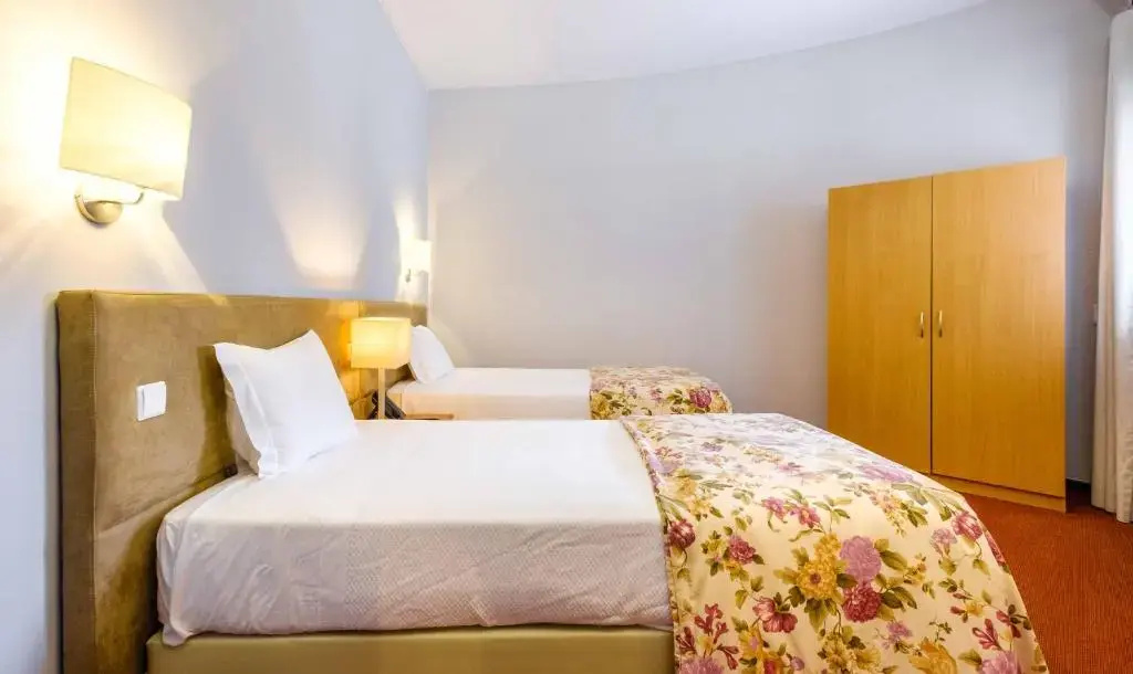 Católica Hotel - Chambres