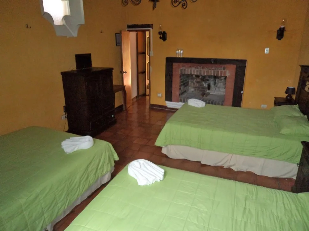 Chez Juanca Hotel Cafe - Chambres