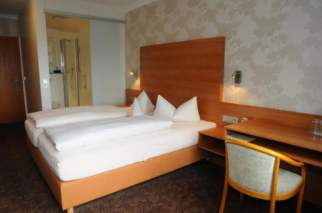 Hotel Vierjahreszeiten - Chambres