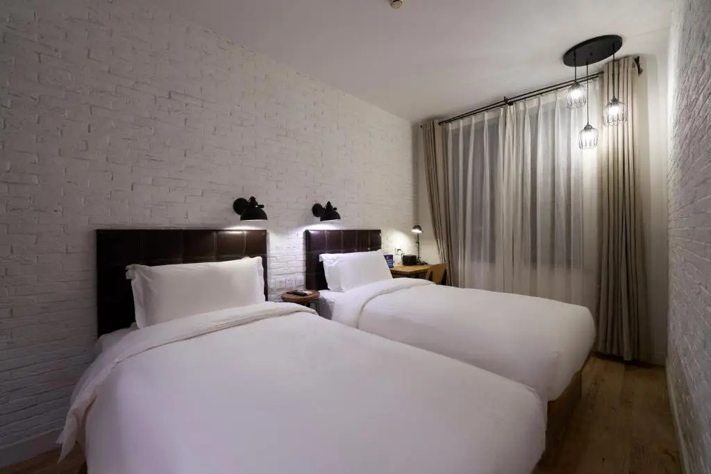 Yi Stack Hotel - Chambres