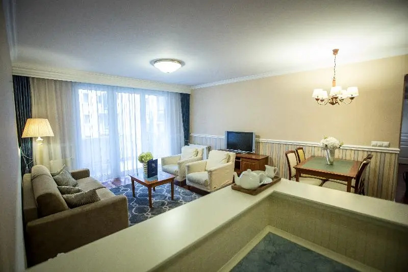 Queen's Court Hotel & Residence - Chambres