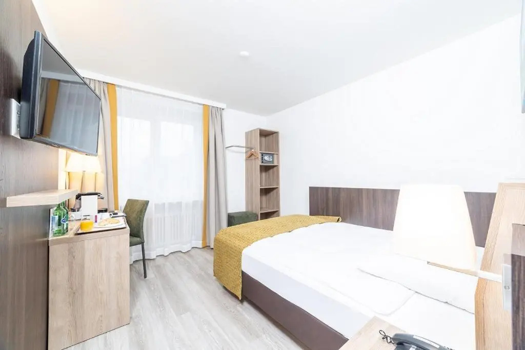 Alfa Hotel - Chambres