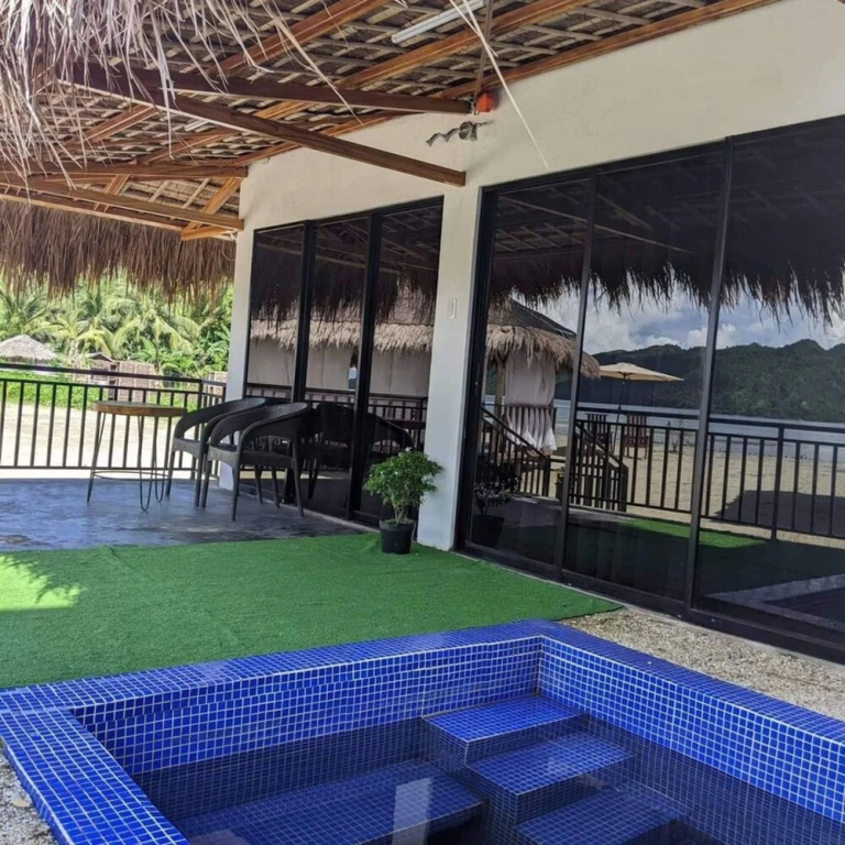 Villa with balcony and beachfront