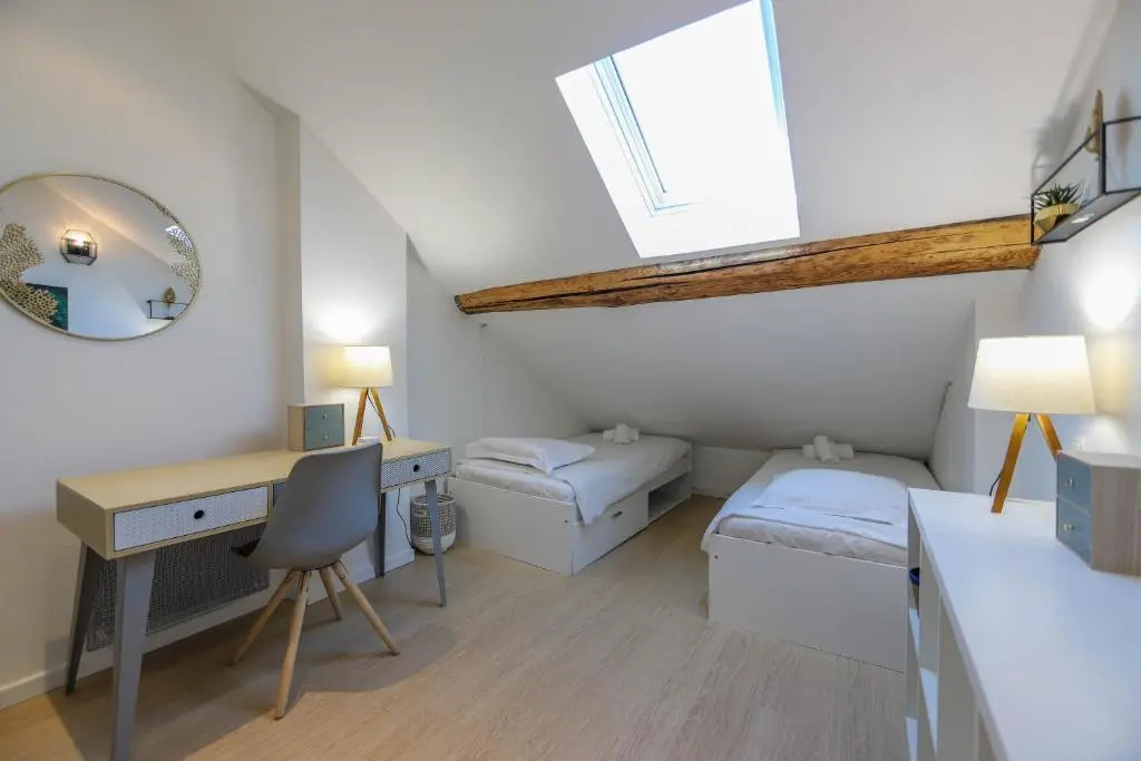 Voir la photo 1 — L'Adorable : 2 chambres en duplex en centre piéton