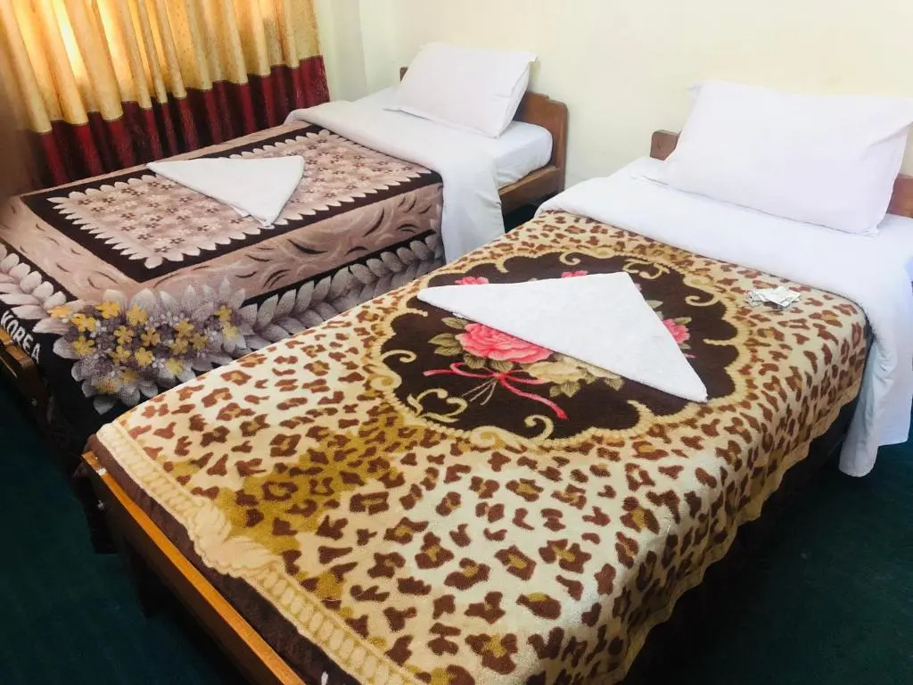 Hotel Green Orchid - Chambres