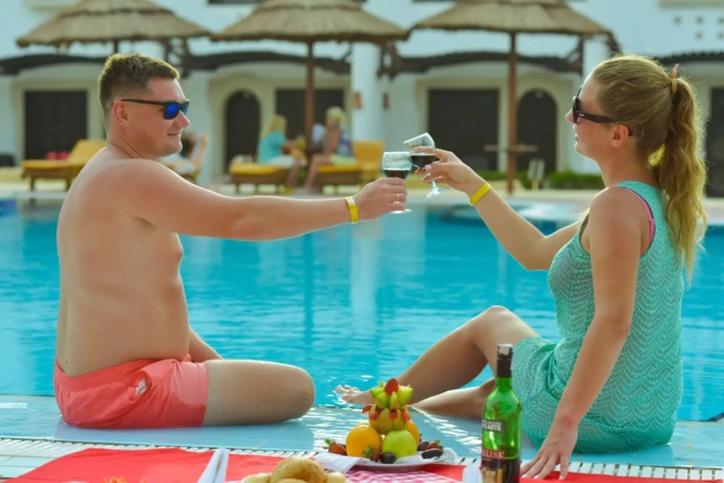 Tivoli Hotel Aqua Park Hotel: Relax by the outdoor pool, with sun loungers and parasols nearby.