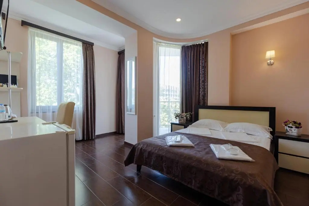 GNS Hotel - Chambres