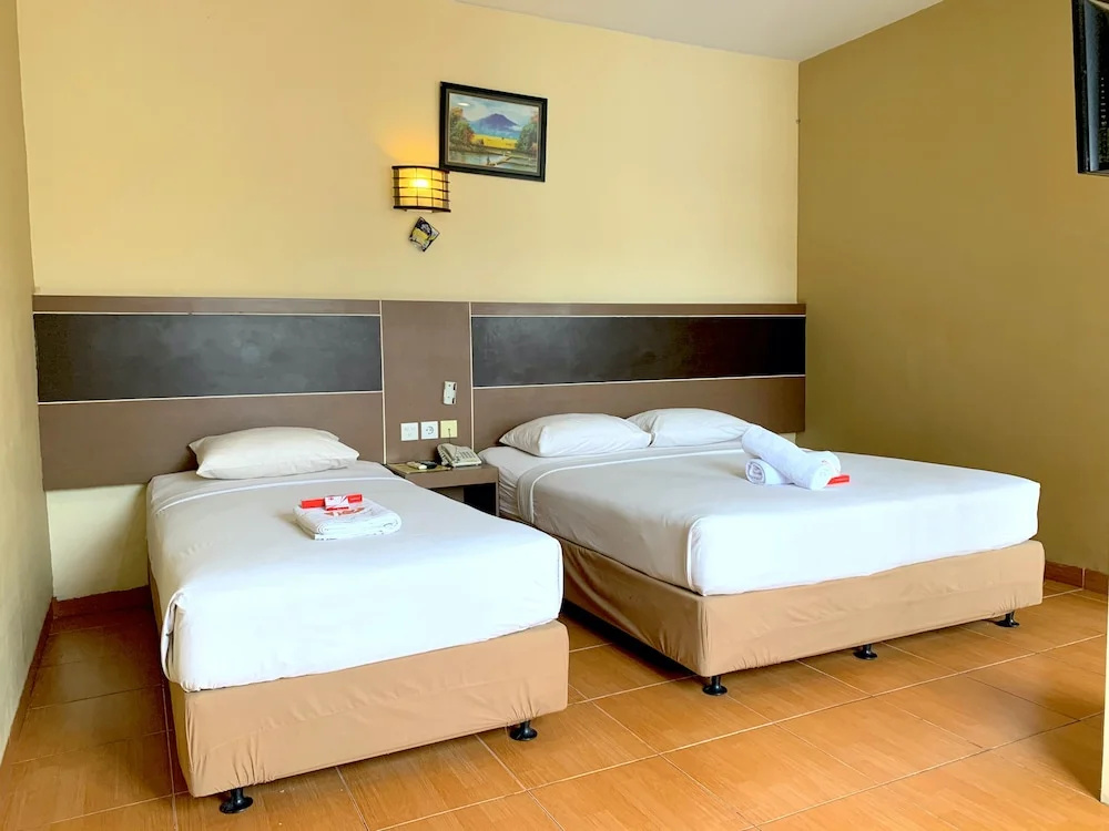 Parma Indah Hotel - Chambres