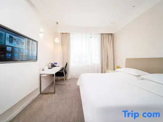 Tian Long Hotel - Chambres