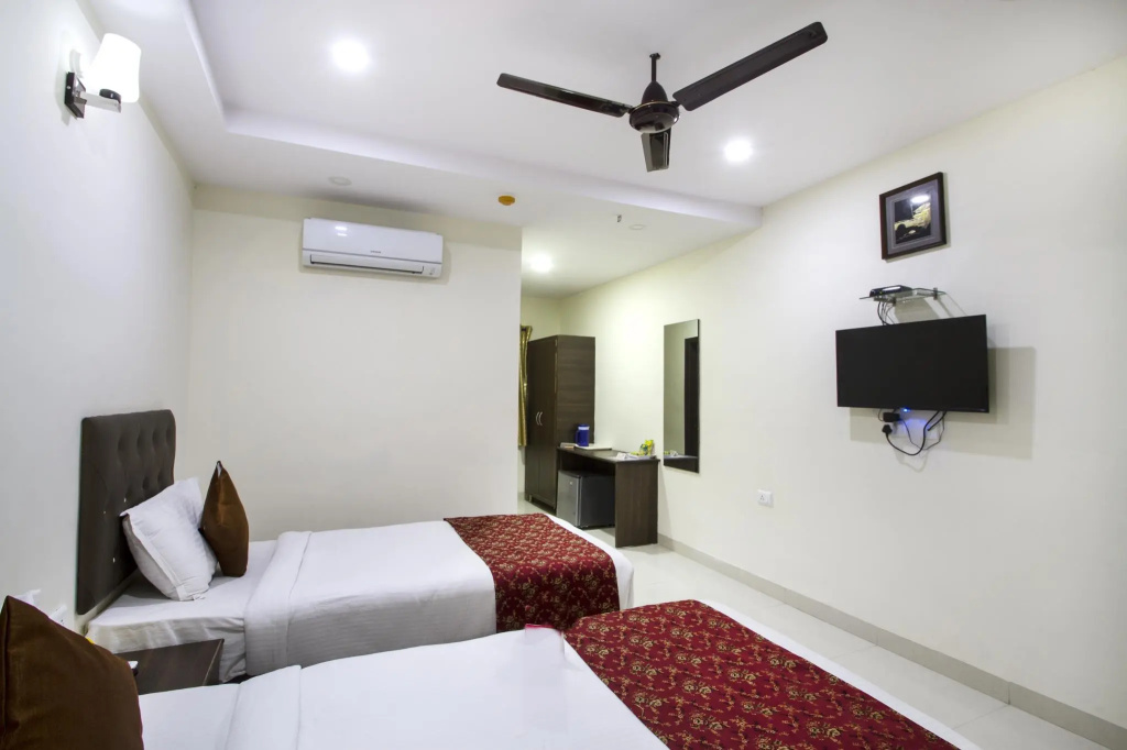 Collection O 3169 Hotel Lotus Grand - Chambres