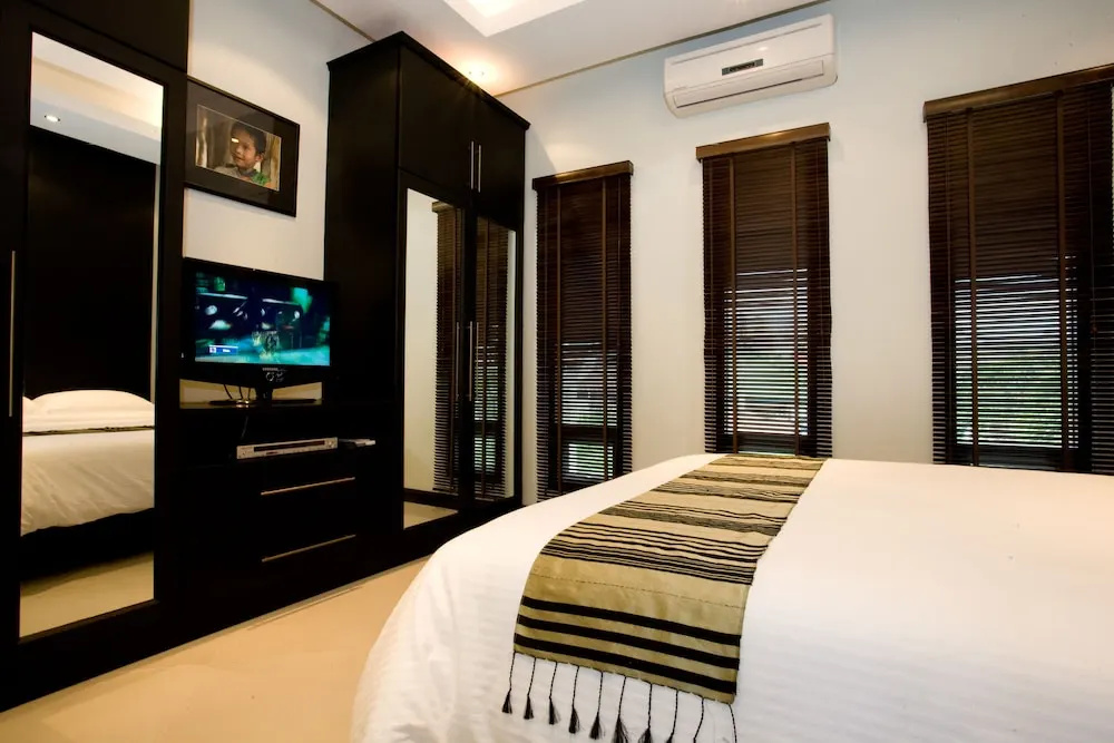 Palm Grove Resort - Chambres