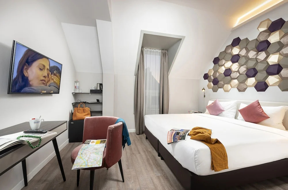 Three Corners Hotel Art - Chambres