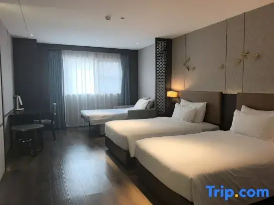 Haiyi Hotel - Chambres
