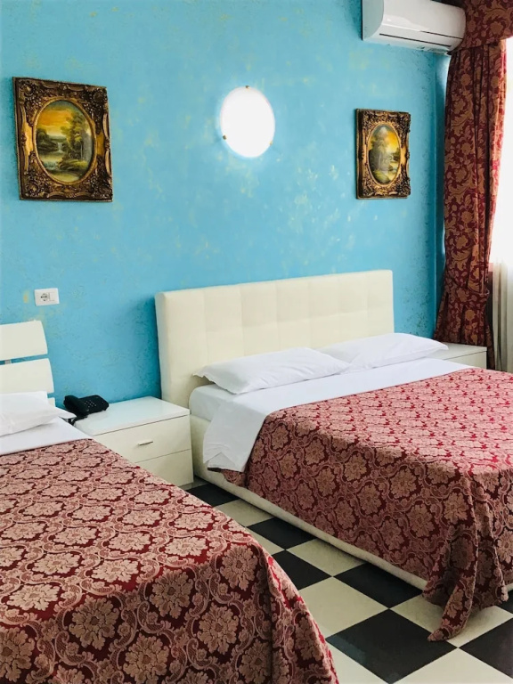 Standard Triple room with balcony