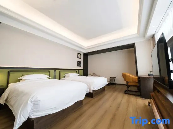 Longyou International Hotel - Chambres