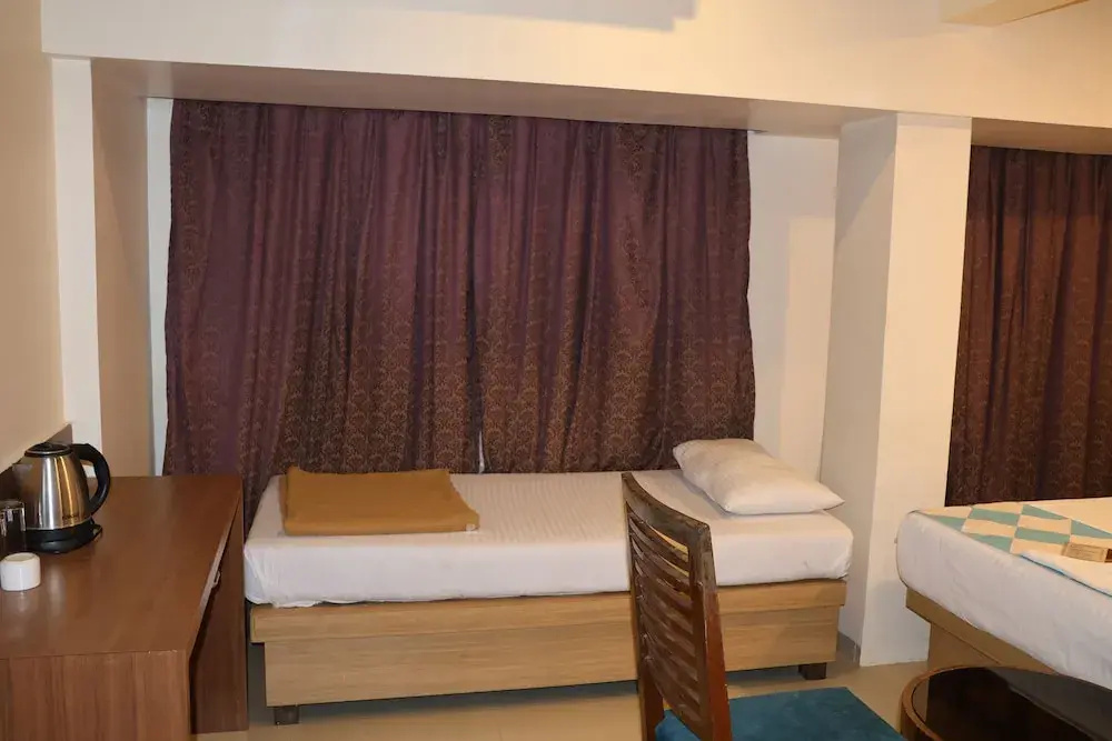 Hotel Aishwarya Residency - Chambres