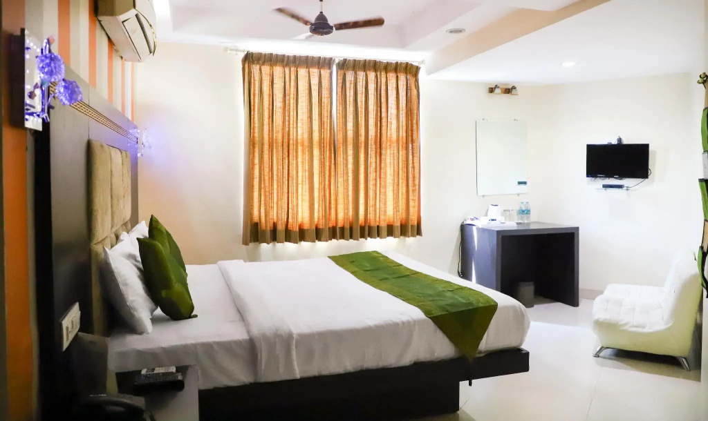 Treebo Trend Orient Grand - Chambres