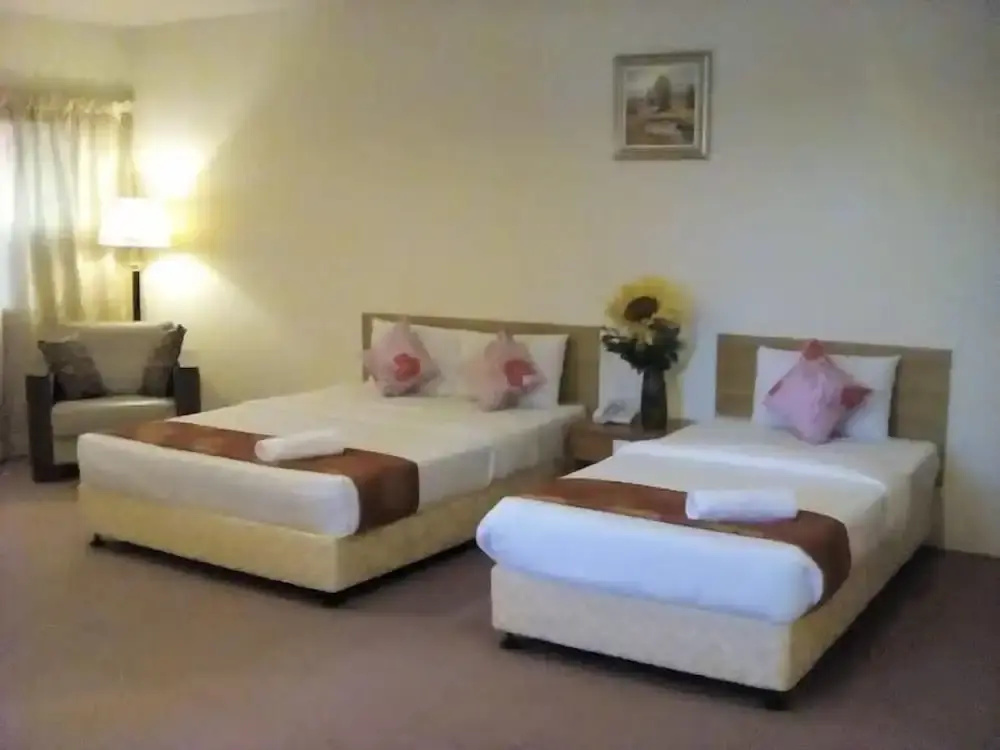 JB Central Hotel - Chambres