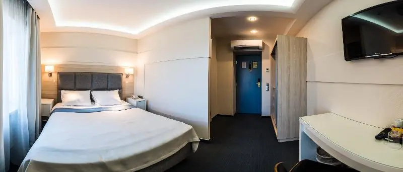 Amrita Hotel - Chambres