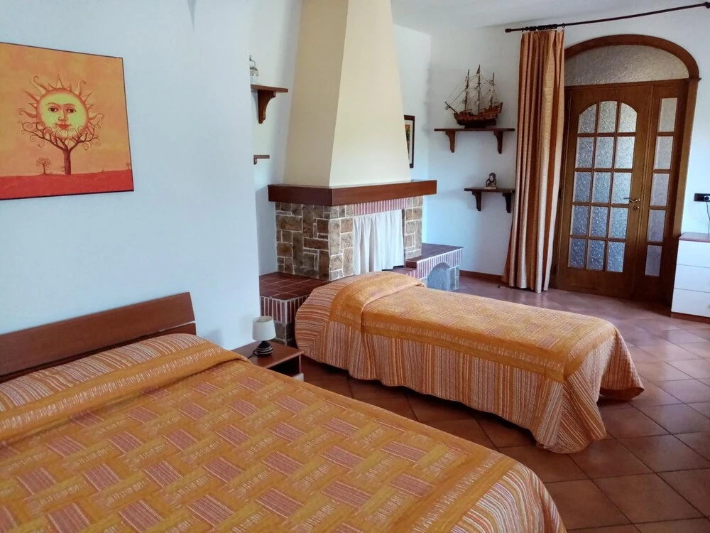 Standard Quadruple room with garden view