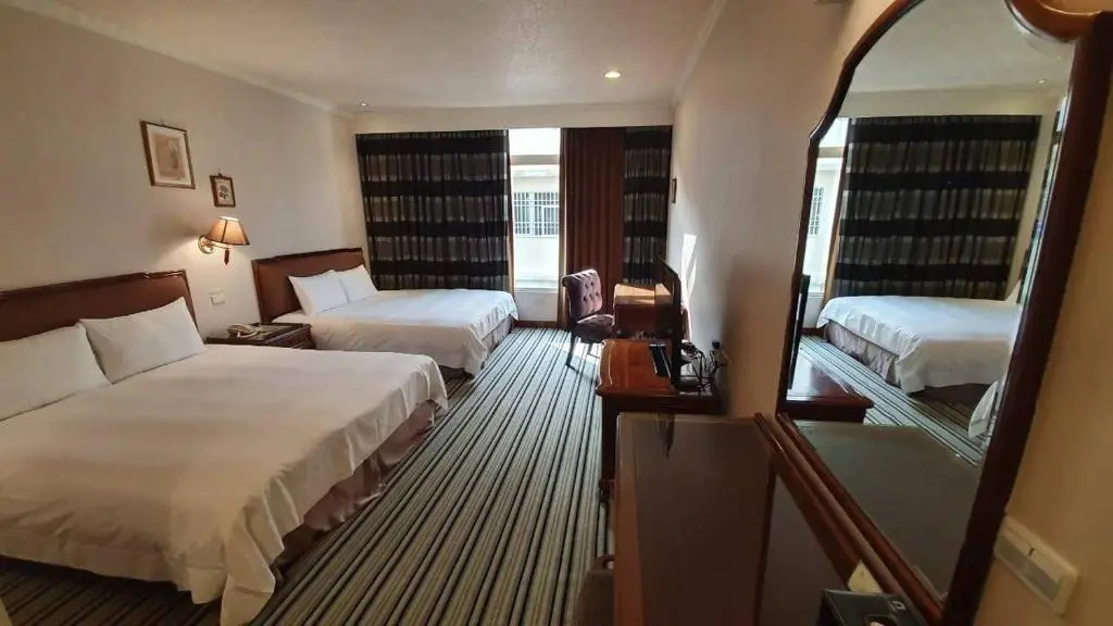 Chia Shih Pao Hotel - Chambres