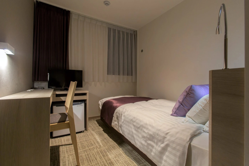 Kita Hotel - Chambres