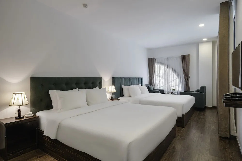 Deluxe Quadruple room with balcony