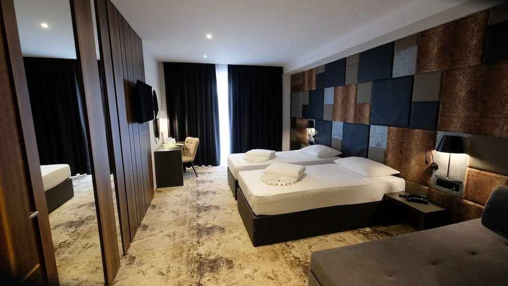 Deluxe Triple room with balcony