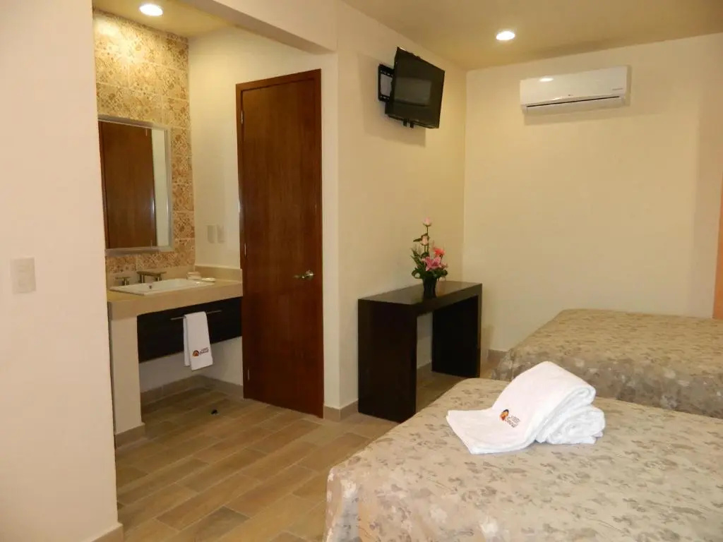 Hotel Plaza Bernal - Chambres