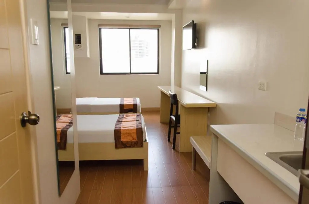 M Suites Hotel - Chambres
