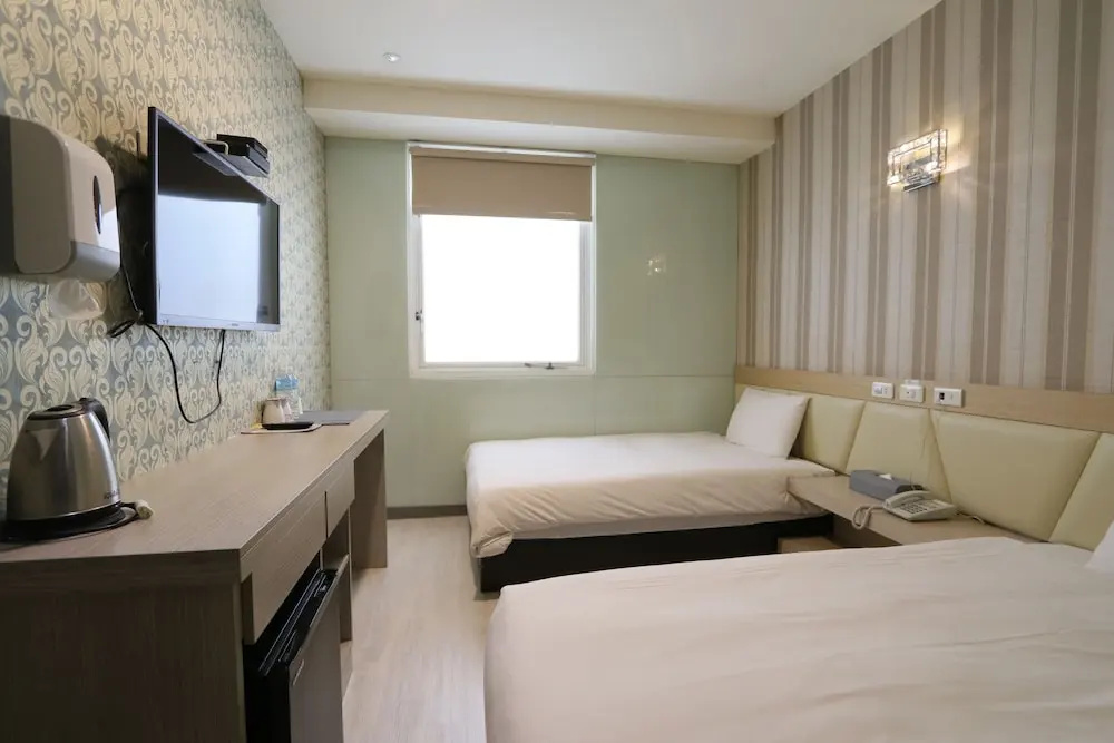 Chao She Hotel - Chambres