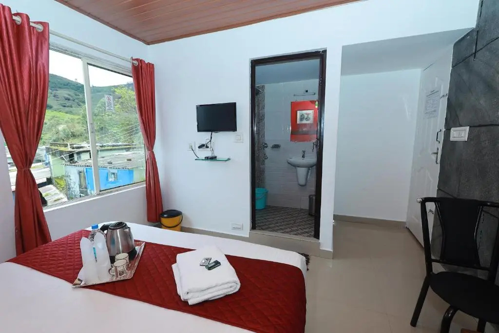 OYO 8653 Achus Inn - Chambres