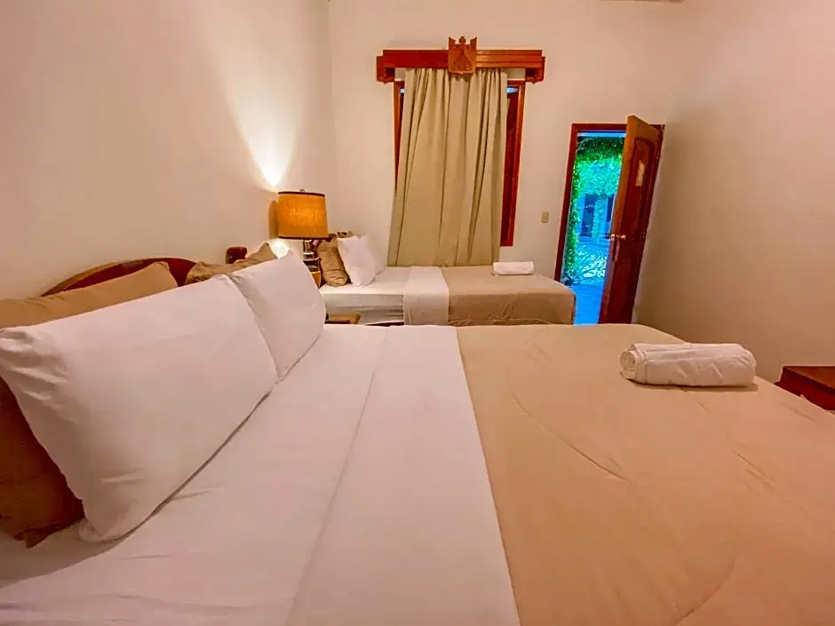 El Carmen Suites - Chambres