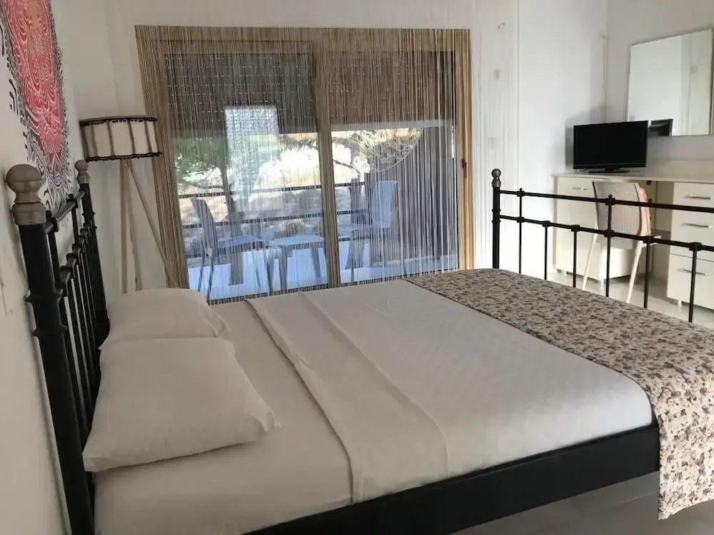 Standard Quadruple Family room with balcony and with garden view