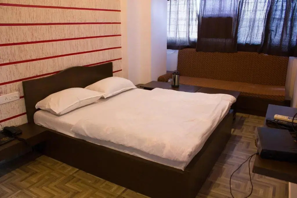 Hotel Holiday Home - Chambres