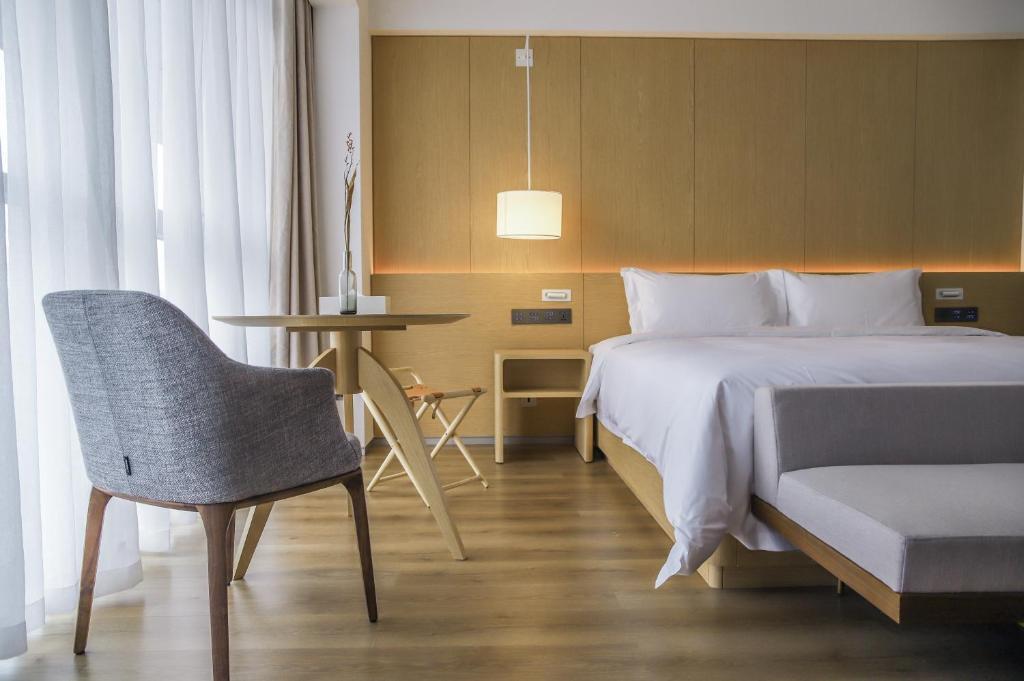Номер Deluxe в Zhengzhou East Railway Station Crossing Hotel