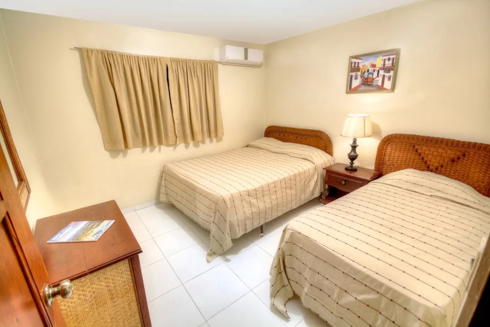 Apart-Hotel Plaza Colonial - Chambres