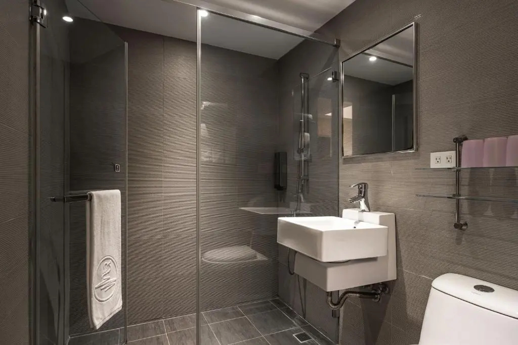 The Riverside Hotel International - Chambres