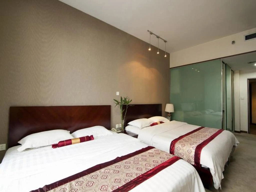 Qingdao 52 Square Meter Apartment Hotel - Chambres