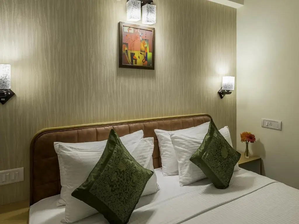 Treebo Akshaya Mayflower Vijaya Bank Layout - Chambres