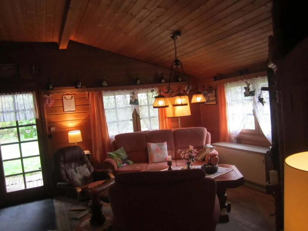 Detached wooden house with fireplace and large garden near Bad Wildungen