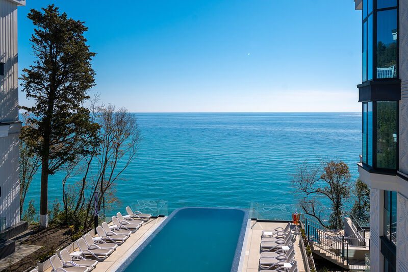 Номер Deluxe с видом на бассейн в Real Apartments Sochi